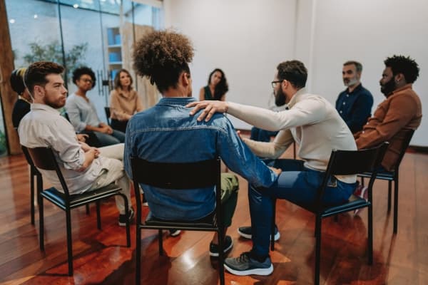 A recovery group meeting together